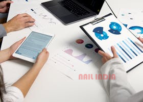 Engineers and designers planning outdoor adventure park layout