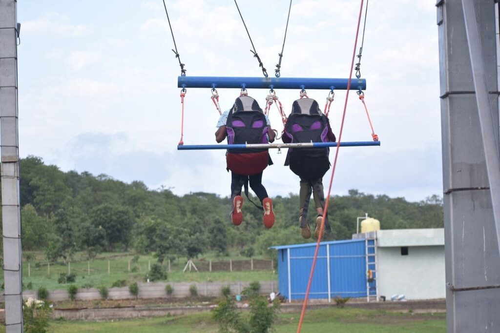 Giant Swing safety harness system