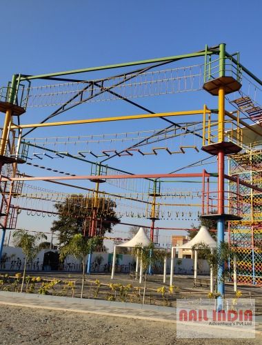 Multi-level rope course adventure setup in Ooty